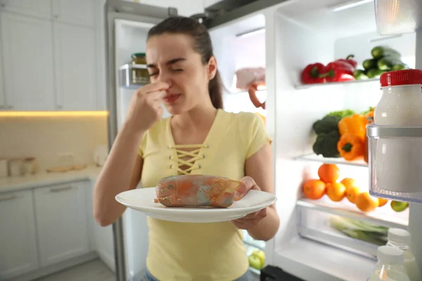 Young Woman Spoiled Sausage Open Refrigerator Kitchen — Stock Photo, Image