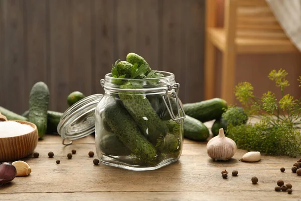 Pickling jar with fresh cucumbers on wooden kitchen table — Stock Image Pickling Jar Fresh Cucumbers Wooden Kitchen Table Stock Photo