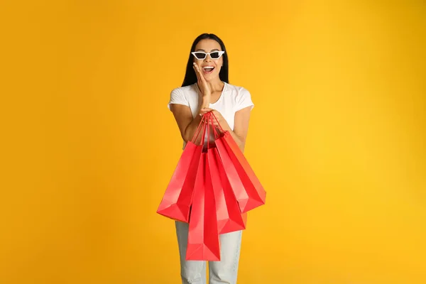 Beautiful Young Woman Paper Shopping Bags Yellow Background — Stock Photo, Image