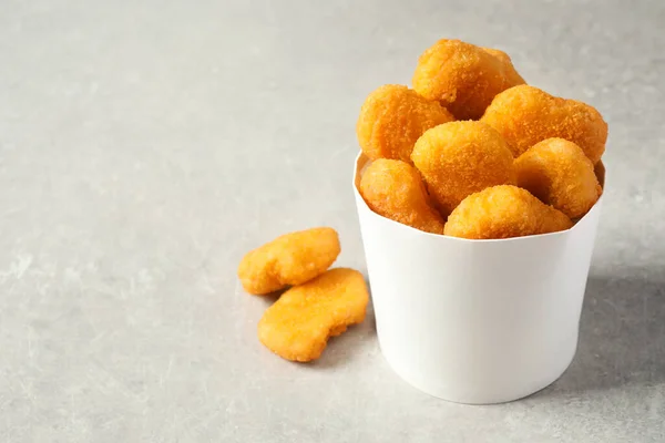 Delicious Fried Chicken Nuggets Light Grey Table Space Text — Stock Photo, Image