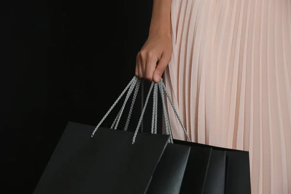 Young Woman Shopping Bags Dark Background Closeup Black Friday Sale — Stock Photo, Image