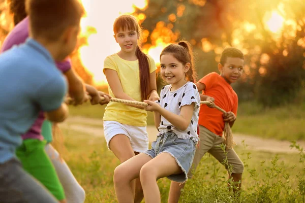 Cute Little Children Playing Tug War Game Outdoors Sunset — Stock Photo, Image