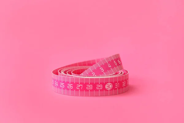 New Measuring Tape Pink Background Closeup — Stock Photo, Image