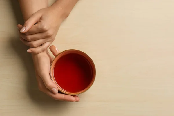 Woman Holding Cup Tea Wooden Table Top View Space Text — Stock Photo, Image