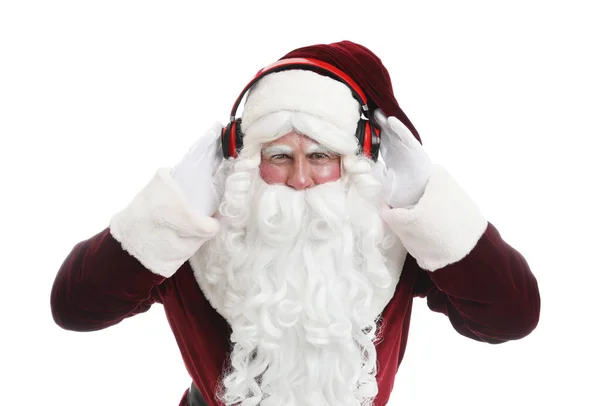 헤드폰을 크리스마스 음악을 배경으로 산타클로스 — 스톡 사진