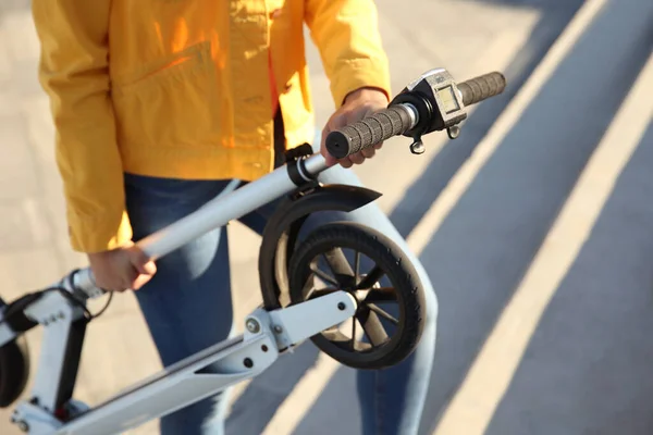 Woman Carrying Folded Electric Kick Scooter Outdoors Closeup — Stock Photo, Image