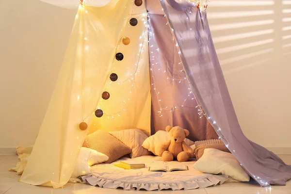 Modern children\'s room interior with play tent