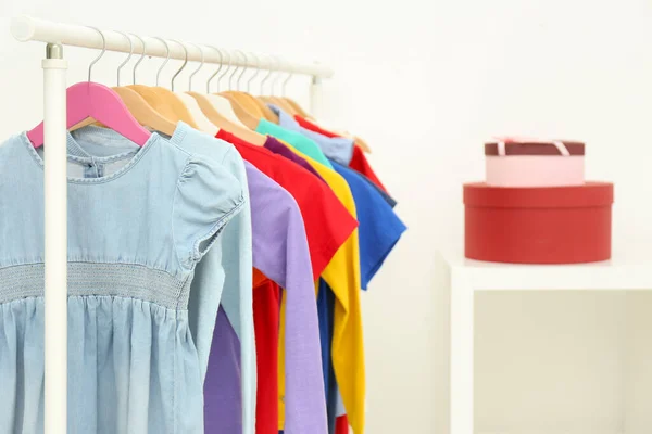 Different Child Clothes Hanging Rack Indoors Space Text — Stock Photo, Image