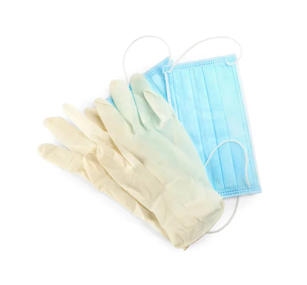 Medische Handschoenen Beschermende Gezichtsmaskers Witte Achtergrond Bovenaanzicht — Stockfoto