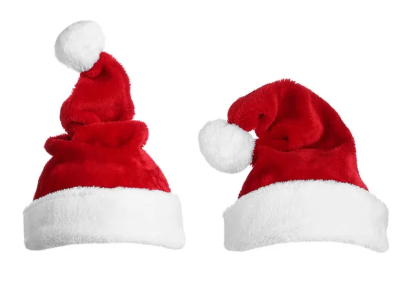 Due Cappelli Babbo Natale Rossi Sfondo Bianco — Foto Stock