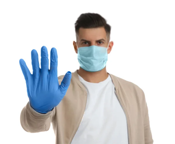 Man Protective Face Mask Medical Gloves Showing Stop Χειρονομία Λευκό — Φωτογραφία Αρχείου