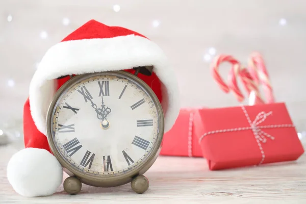 Vintage Alarm Clock Decor White Wooden Table Blurred Christmas Lights — Stock Photo, Image