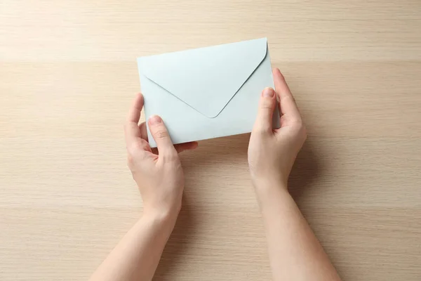 Woman White Paper Envelope Wooden Table Top View — Stock Photo, Image