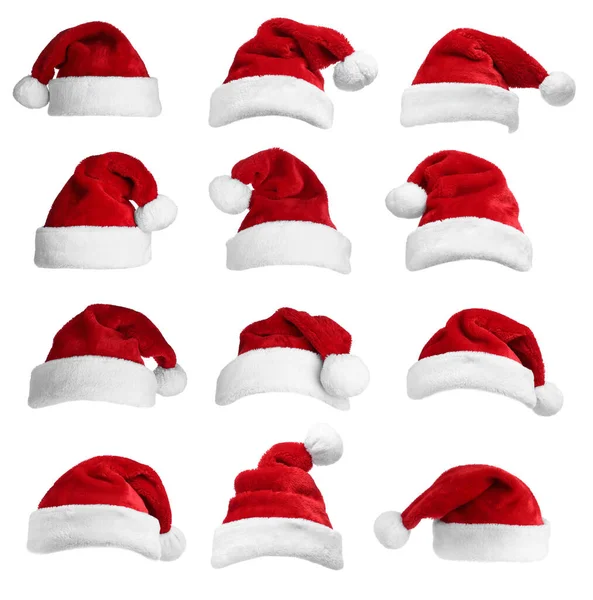Set Roter Weihnachtsmützen Auf Weißem Hintergrund — Stockfoto