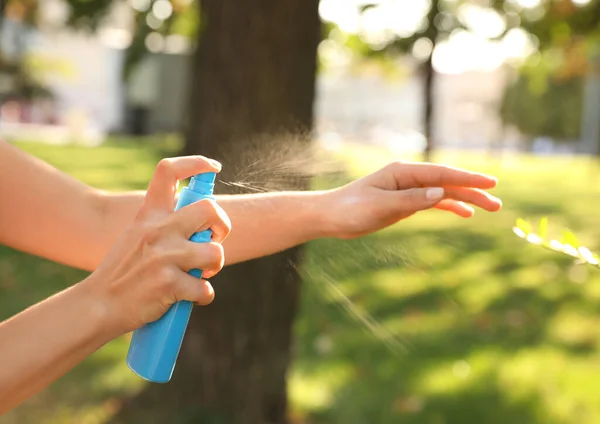 Woman Applying Insect Repellent Hand Park Closeup — Stock Photo, Image