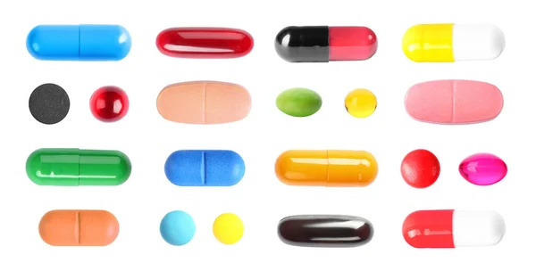 Set Avec Des Pilules Colorées Sur Fond Blanc Vue Dessus — Photo