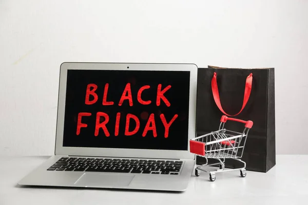 Laptop Shopping Bag Small Cart Grey Table Black Friday Sale — Stock Photo, Image