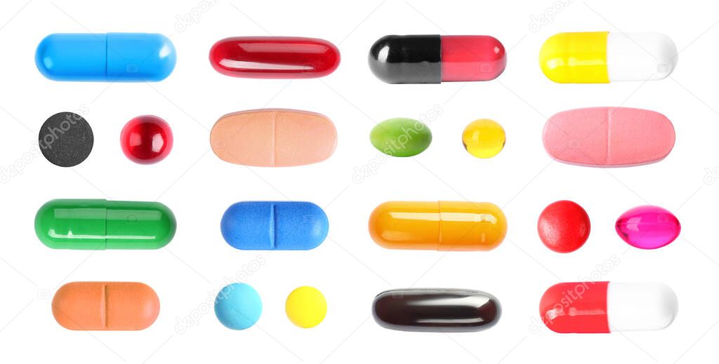 Set with colorful pills on white background, top view. Banner design