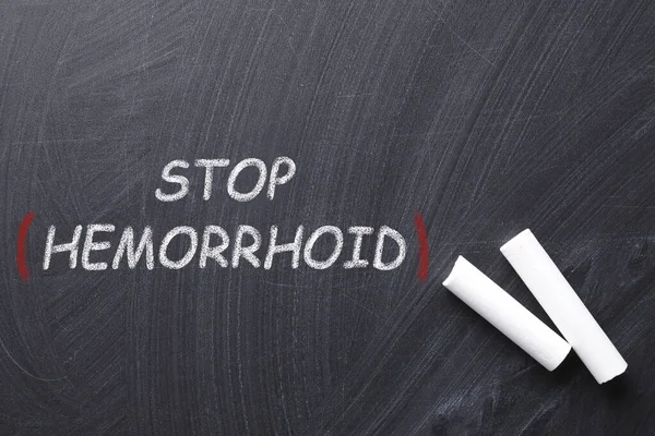 Дошці Лежали Шматочки Білої Крейди Фраза Stop Hemorrhoid — стокове фото