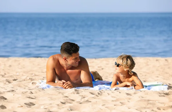 Father Son Lying Sandy Beach Sea Summer Holidays Family Stock Picture