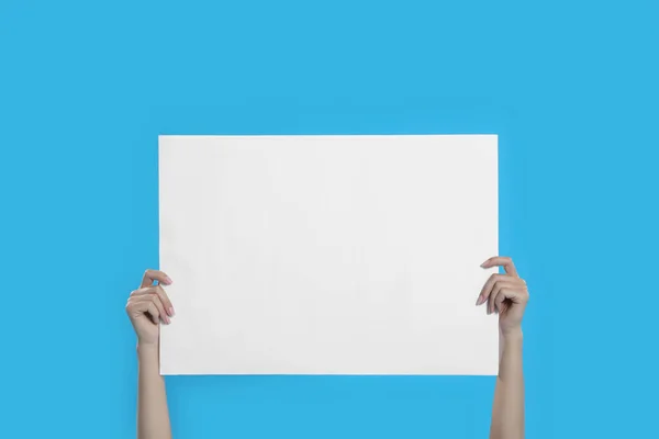 Woman Holding Blank Poster Blue Background Closeup — Stock Photo, Image
