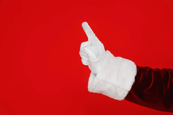 Der Weihnachtsmann Zeigt Auf Etwas Auf Rotem Grund Nahaufnahme Der — Stockfoto