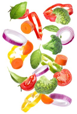 Set of different fresh vegetables falling on white background clipart