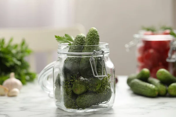 Pickling jar with fresh cucumbers on white marble table — Stock Image Pickling Jar Fresh Cucumbers White Marble Table Stock Photo