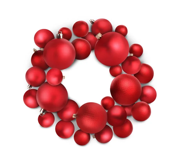 白い背景に赤いクリスマスボールの美しいお祝いの花輪 トップビュー — ストック写真