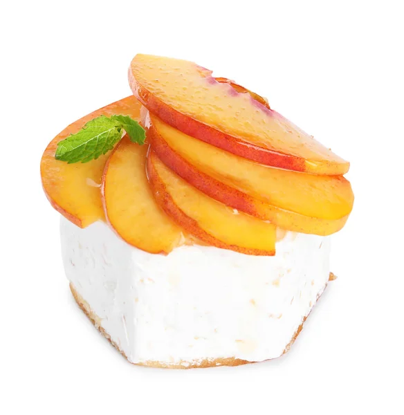 Delicious dessert with peach slices isolated on white