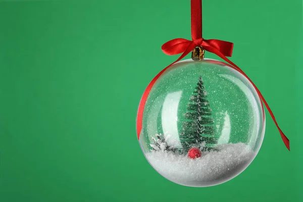 Beautiful Christmas Snow Globe Hanging Green Background Closeup Space Text — Stock Photo, Image