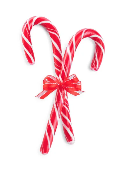 Sweet Christmas Snoep Stokken Met Rode Strik Witte Achtergrond Bovenaanzicht — Stockfoto