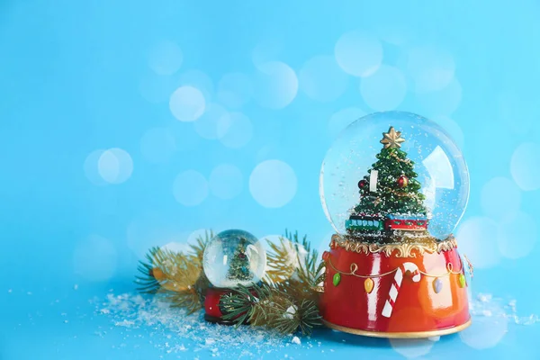 Beautiful Christmas Snow Globes Light Blue Background Bokeh Effect Space — Stock Photo, Image