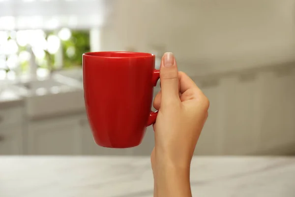 Woman Holding Elegant Red Cup Kitchen Closeup — Stock Photo, Image