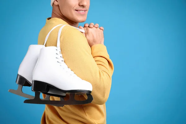 Happy Man Ice Skates Light Blue Background Closeup Space Text — Stock Photo, Image