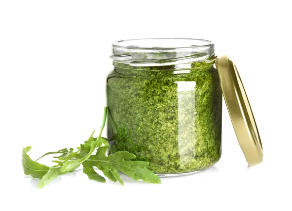 Glas Mit Leckerem Pesto Und Rucola Auf Weißem Hintergrund — Stockfoto