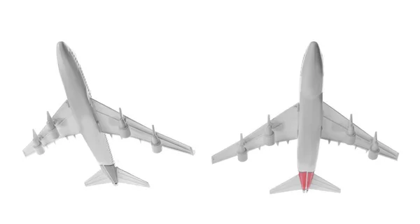 Twee Speelgoedvliegtuigen Geïsoleerd Wit Onderaanzicht — Stockfoto