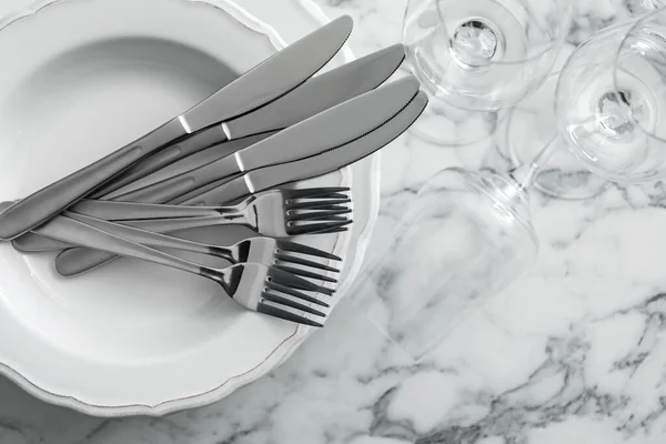 Plates Cutlery Glasses White Marble Table Top View — 스톡 사진
