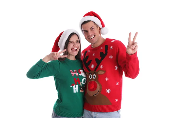 Hermosa Pareja Feliz Sombreros Santa Suéteres Navidad Que Divierten Sobre —  Fotos de Stock