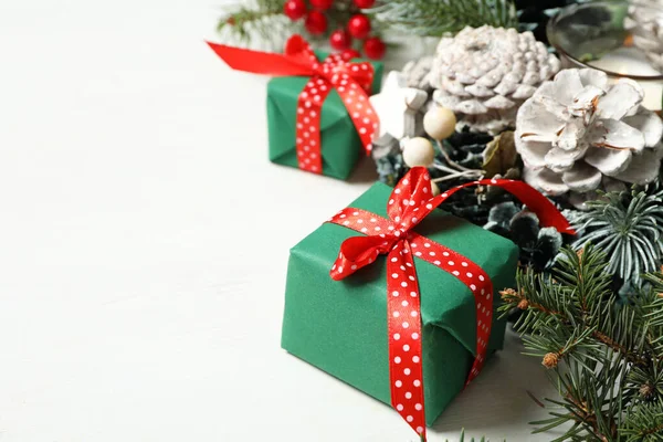 Green Christmas Gift Boxes Fir Tree Branches White Wooden Table — Stock Photo, Image