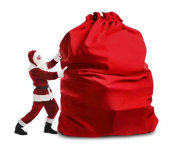 Санта Клаус Огромной Красной Сумкой Полной Рождественских Подарков Белом Фоне — стоковое фото