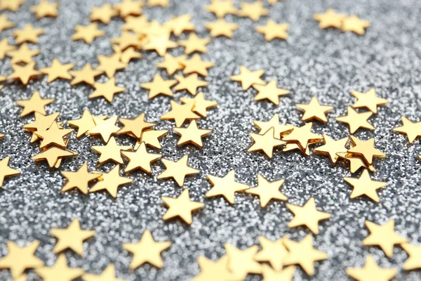 Confetti Estrellas Sobre Fondo Gris Primer Plano Celebración Navidad —  Fotos de Stock