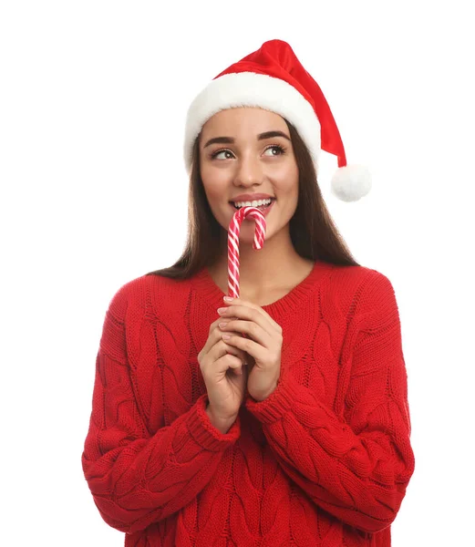 Kırmızı Kazaklı Noel Baba Şapkalı Beyaz Arka Planda Şeker Yiyen — Stok fotoğraf