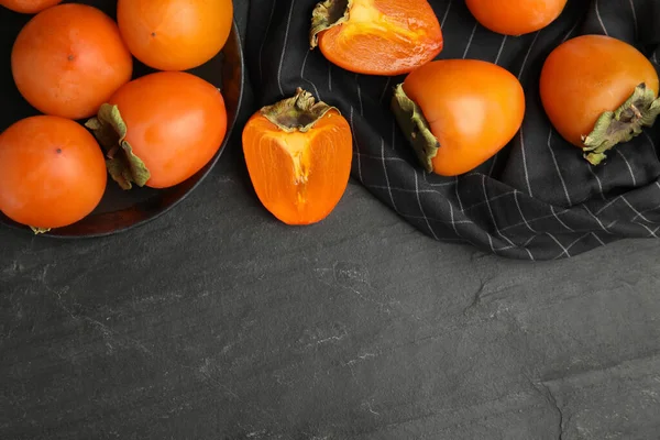Tasty Ripe Persimmons Black Slate Table Flat Lay Space Text — Stock Photo, Image