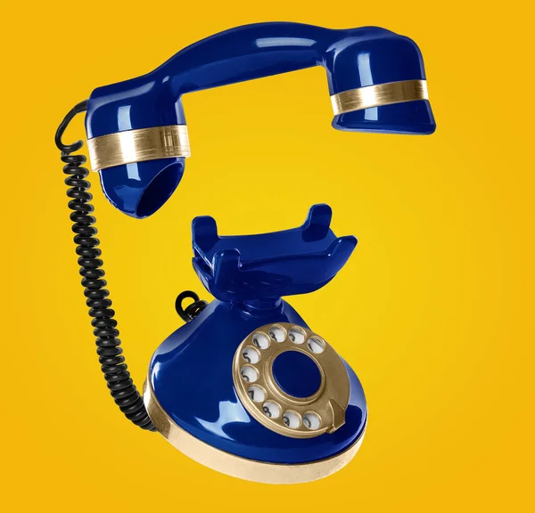 Vintage Téléphone Fil Bleu Volant Dans Air Sur Fond Jaune — Photo