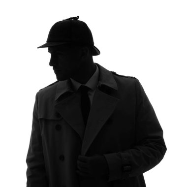 Beyaz arka planda şapkalı eski moda dedektif.