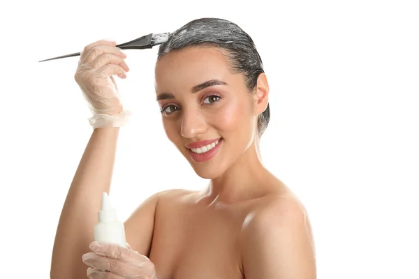 Young Woman Applying Dye Hairs White Background — Stock Photo, Image