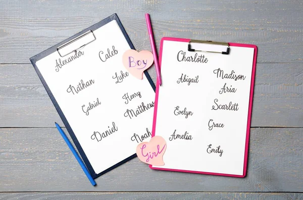 Clipboards Different Baby Names Felt Tip Pens Grey Wooden Table — Stock Photo, Image