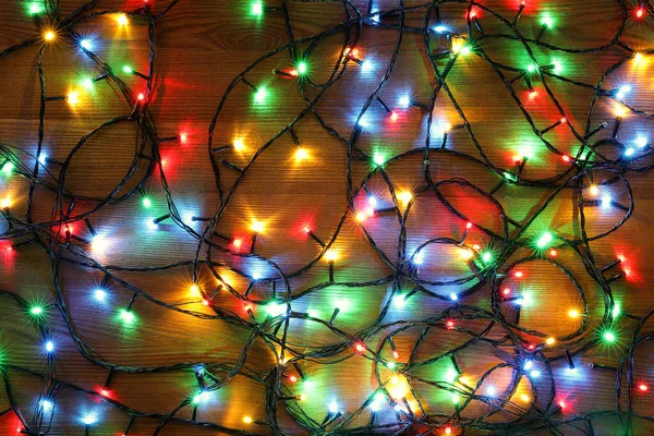 Colorful Christmas Lights Wooden Table Top View — Stockfoto