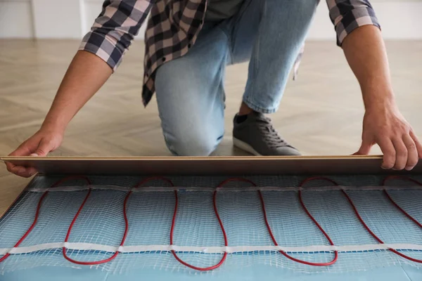 Professional Contractor Installing Underfloor Trace Heating System Indoors Closeup — Stock Photo, Image